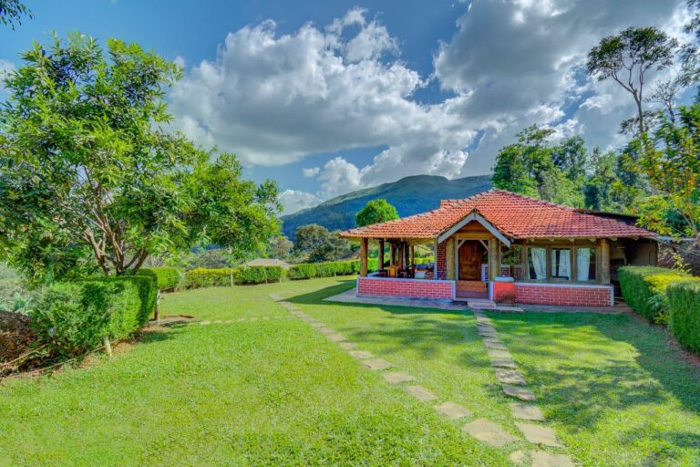Green lawn area Raja cottage coorg 768x512